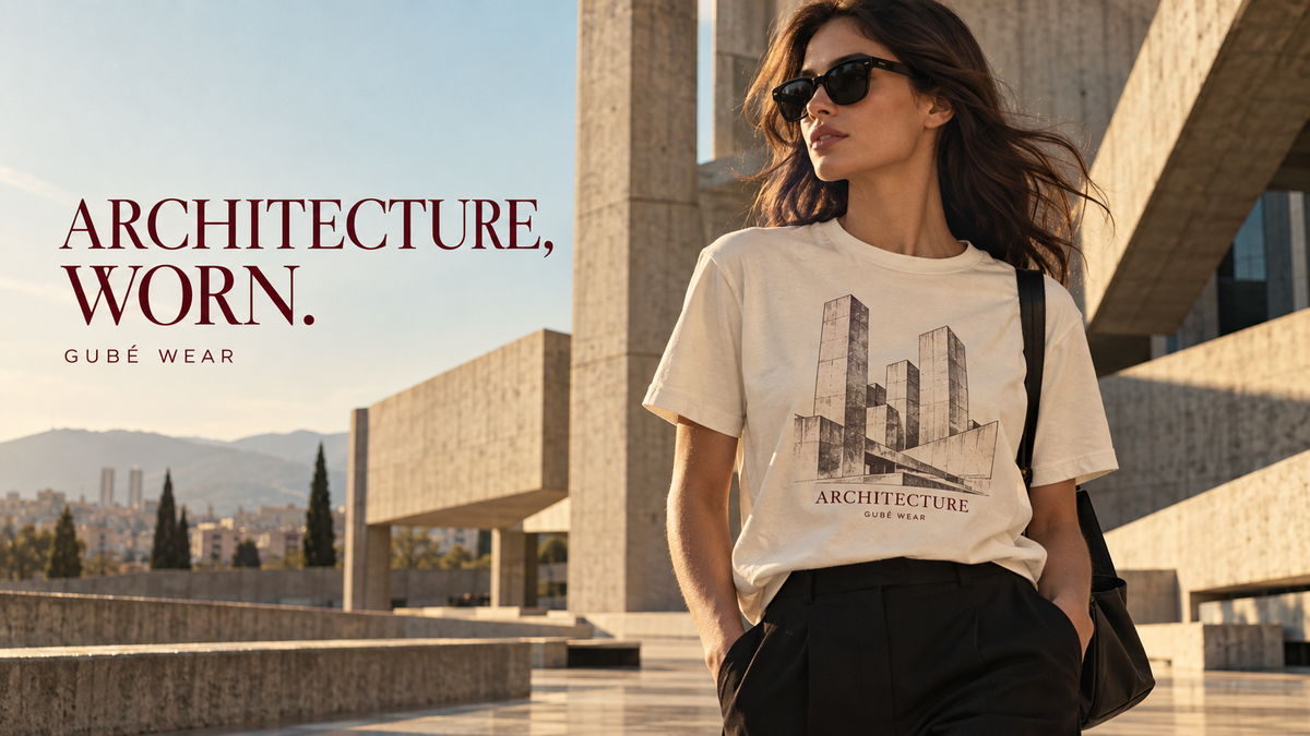 Woman wearing an architecture graphic T-shirt in a Brutalist concrete plaza — GUBÉ WEAR.